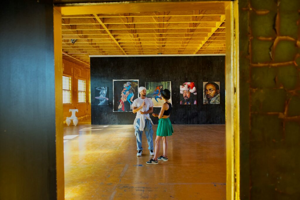 A couple of people that are standing in a room